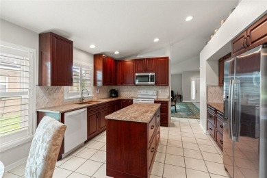 Wonderful home located on the 12th hole of the Lexington Oaks on Lexington Oaks Golf Club in Florida - for sale on GolfHomes.com, golf home, golf lot