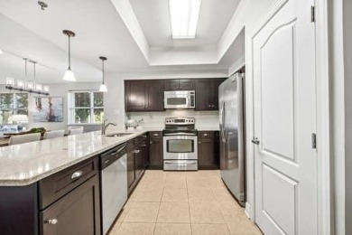 Ground-Floor Convenience Meets Resort-Style Living! This on Seascape Golf Course in Florida - for sale on GolfHomes.com, golf home, golf lot