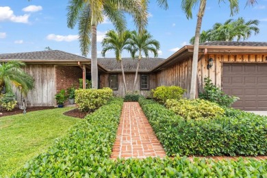 New roof coming soon.This beautiful CBS home  with cedar wood on West Palm Beach Golf Course in Florida - for sale on GolfHomes.com, golf home, golf lot