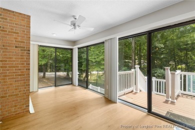Welcome to a beautifully, partially updated brick home nestled on Carolina Trace Country Club in North Carolina - for sale on GolfHomes.com, golf home, golf lot
