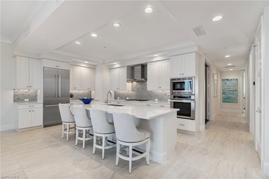 This refined 16th-floor residence in Seaglass at Bonita Bay on Bonita Bay West in Florida - for sale on GolfHomes.com, golf home, golf lot