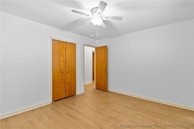 Welcome to a beautifully, partially updated brick home nestled on Carolina Trace Country Club in North Carolina - for sale on GolfHomes.com, golf home, golf lot