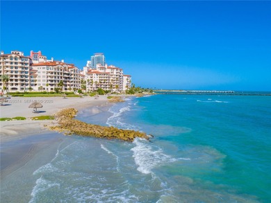 Step onto the pristine sands of Fisher Island and embrace the on Fisher Island Club in Florida - for sale on GolfHomes.com, golf home, golf lot