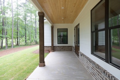 The Reagan plan built by Tradecraft Homes. Stunning new on Harbor Club Golf and Country Club in Georgia - for sale on GolfHomes.com, golf home, golf lot