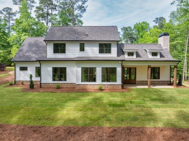 The Reagan plan built by Tradecraft Homes. Stunning new on Harbor Club Golf and Country Club in Georgia - for sale on GolfHomes.com, golf home, golf lot