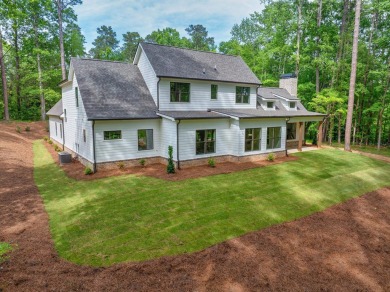 The Reagan plan built by Tradecraft Homes. Stunning new on Harbor Club Golf and Country Club in Georgia - for sale on GolfHomes.com, golf home, golf lot