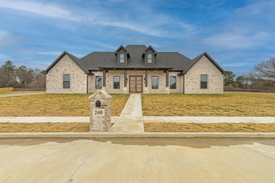 Exquisite 2697 sq ft custom home (4300 sq ft under roof) with 4 on Eagles Bluff Golf Course in Texas - for sale on GolfHomes.com, golf home, golf lot