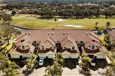 This beautifully maintained Mediterranean Carriage home on Palm Aire Country Club of Sarasota in Florida - for sale on GolfHomes.com, golf home, golf lot