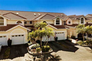 This beautifully maintained Mediterranean Carriage home on Palm Aire Country Club of Sarasota in Florida - for sale on GolfHomes.com, golf home, golf lot