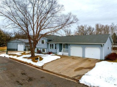 This beautifully maintained 4 bedroom, 2 bath home on the edge on Rolling Oaks Golf Course in Wisconsin - for sale on GolfHomes.com, golf home, golf lot