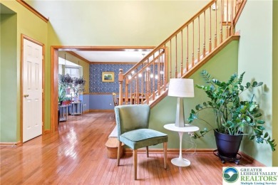 Perched atop a scenic hilltop, 136 Outlook Court offers a unique on Country Club of the Poconos Golf Course in Pennsylvania - for sale on GolfHomes.com, golf home, golf lot