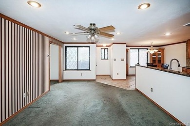 Discover this charming first-floor 2-bedroom condo in the highly on Blue Ridge Golf Club in New York - for sale on GolfHomes.com, golf home, golf lot