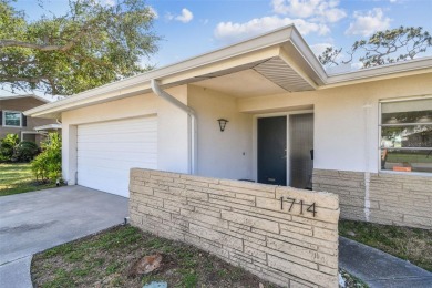 Mid-Century Modern Ranch on Pelican Golf Course.
Bathed in on Belleview Biltmore Golf Club in Florida - for sale on GolfHomes.com, golf home, golf lot