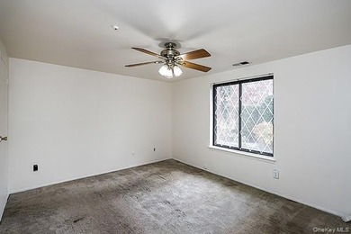 Discover this charming first-floor 2-bedroom condo in the highly on Blue Ridge Golf Club in New York - for sale on GolfHomes.com, golf home, golf lot