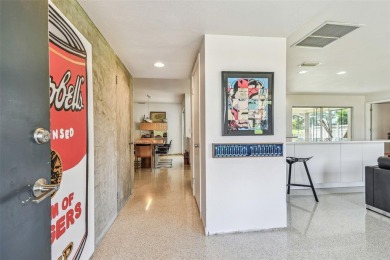Mid-Century Modern Ranch on Pelican Golf Course.
Bathed in on Belleview Biltmore Golf Club in Florida - for sale on GolfHomes.com, golf home, golf lot