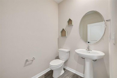 This tastefully done resort style townhome in a gated community on Gulf Harbors Golf Course in Florida - for sale on GolfHomes.com, golf home, golf lot