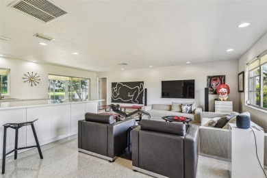 Mid-Century Modern Ranch on Pelican Golf Course.
Bathed in on Belleview Biltmore Golf Club in Florida - for sale on GolfHomes.com, golf home, golf lot