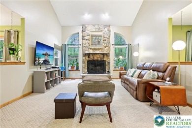 Perched atop a scenic hilltop, 136 Outlook Court offers a unique on Country Club of the Poconos Golf Course in Pennsylvania - for sale on GolfHomes.com, golf home, golf lot