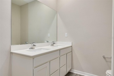 This tastefully done resort style townhome in a gated community on Gulf Harbors Golf Course in Florida - for sale on GolfHomes.com, golf home, golf lot