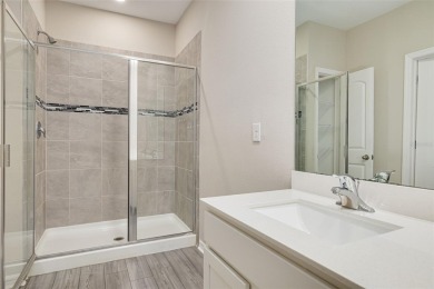This tastefully done resort style townhome in a gated community on Gulf Harbors Golf Course in Florida - for sale on GolfHomes.com, golf home, golf lot