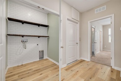 This tastefully done resort style townhome in a gated community on Gulf Harbors Golf Course in Florida - for sale on GolfHomes.com, golf home, golf lot