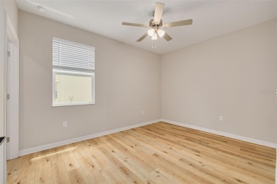 This tastefully done resort style townhome in a gated community on Gulf Harbors Golf Course in Florida - for sale on GolfHomes.com, golf home, golf lot