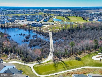 Experience the pinnacle of modern living and serene luxury in on Plantation Lakes Golf and Country Club in Delaware - for sale on GolfHomes.com, golf home, golf lot