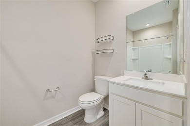 This tastefully done resort style townhome in a gated community on Gulf Harbors Golf Course in Florida - for sale on GolfHomes.com, golf home, golf lot