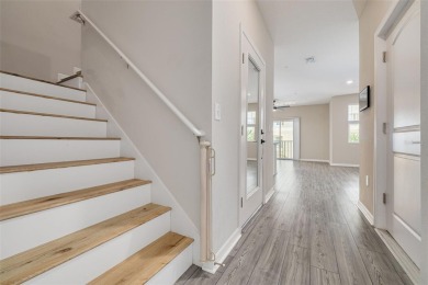 This tastefully done resort style townhome in a gated community on Gulf Harbors Golf Course in Florida - for sale on GolfHomes.com, golf home, golf lot