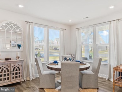 Experience the pinnacle of modern living and serene luxury in on Plantation Lakes Golf and Country Club in Delaware - for sale on GolfHomes.com, golf home, golf lot