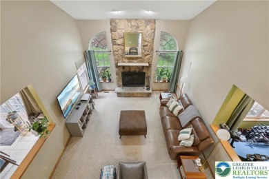 Perched atop a scenic hilltop, 136 Outlook Court offers a unique on Country Club of the Poconos Golf Course in Pennsylvania - for sale on GolfHomes.com, golf home, golf lot