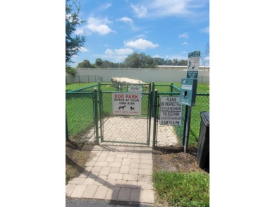 This tastefully done resort style townhome in a gated community on Gulf Harbors Golf Course in Florida - for sale on GolfHomes.com, golf home, golf lot