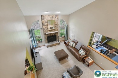 Perched atop a scenic hilltop, 136 Outlook Court offers a unique on Country Club of the Poconos Golf Course in Pennsylvania - for sale on GolfHomes.com, golf home, golf lot