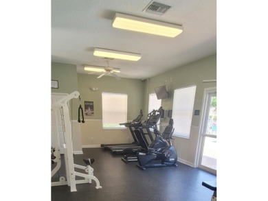This tastefully done resort style townhome in a gated community on Gulf Harbors Golf Course in Florida - for sale on GolfHomes.com, golf home, golf lot