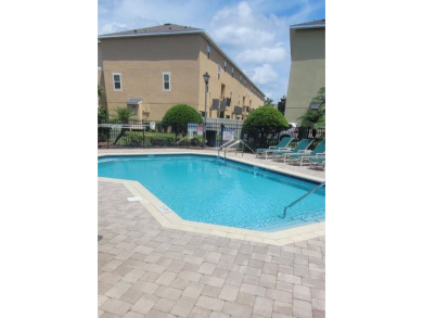 This tastefully done resort style townhome in a gated community on Gulf Harbors Golf Course in Florida - for sale on GolfHomes.com, golf home, golf lot
