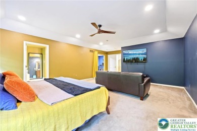 Perched atop a scenic hilltop, 136 Outlook Court offers a unique on Country Club of the Poconos Golf Course in Pennsylvania - for sale on GolfHomes.com, golf home, golf lot