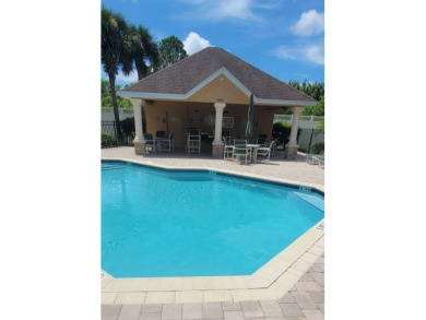 This tastefully done resort style townhome in a gated community on Gulf Harbors Golf Course in Florida - for sale on GolfHomes.com, golf home, golf lot