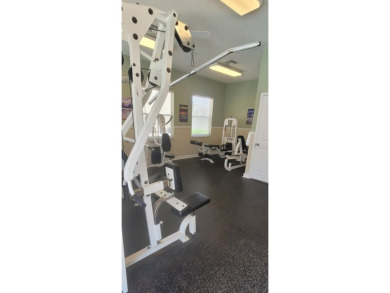 This tastefully done resort style townhome in a gated community on Gulf Harbors Golf Course in Florida - for sale on GolfHomes.com, golf home, golf lot