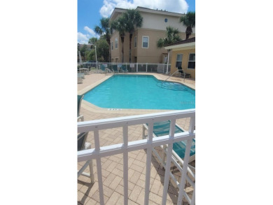 This tastefully done resort style townhome in a gated community on Gulf Harbors Golf Course in Florida - for sale on GolfHomes.com, golf home, golf lot