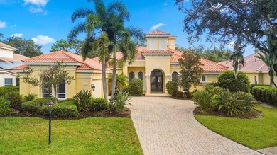 This elegant Mediterranean-style residence offers timeless on University Park Country Club in Florida - for sale on GolfHomes.com, golf home, golf lot