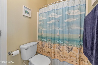 This 3 BR, 2.5 bathroom Osprey Ridge end unit condo in the on Sea Trail Golf Resort in North Carolina - for sale on GolfHomes.com, golf home, golf lot