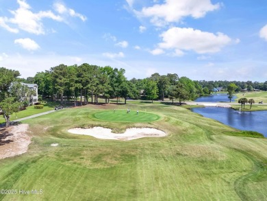 This 3 BR, 2.5 bathroom Osprey Ridge end unit condo in the on Sea Trail Golf Resort in North Carolina - for sale on GolfHomes.com, golf home, golf lot