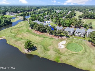 This 3 BR, 2.5 bathroom Osprey Ridge end unit condo in the on Sea Trail Golf Resort in North Carolina - for sale on GolfHomes.com, golf home, golf lot