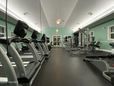 This 3 BR, 2.5 bathroom Osprey Ridge end unit condo in the on Sea Trail Golf Resort in North Carolina - for sale on GolfHomes.com, golf home, golf lot