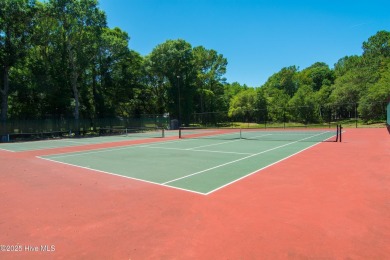 This 3 BR, 2.5 bathroom Osprey Ridge end unit condo in the on Sea Trail Golf Resort in North Carolina - for sale on GolfHomes.com, golf home, golf lot