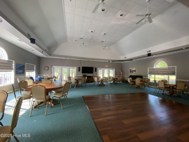 This 3 BR, 2.5 bathroom Osprey Ridge end unit condo in the on Sea Trail Golf Resort in North Carolina - for sale on GolfHomes.com, golf home, golf lot