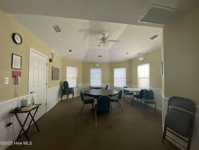 This 3 BR, 2.5 bathroom Osprey Ridge end unit condo in the on Sea Trail Golf Resort in North Carolina - for sale on GolfHomes.com, golf home, golf lot