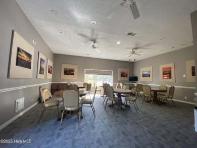 This 3 BR, 2.5 bathroom Osprey Ridge end unit condo in the on Sea Trail Golf Resort in North Carolina - for sale on GolfHomes.com, golf home, golf lot