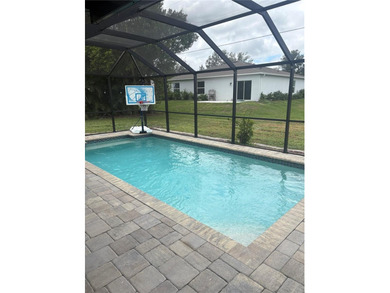 This Stunning 3 bed/2 bath Pool home in Harbour Heights is on Deep Creek Golf Club in Florida - for sale on GolfHomes.com, golf home, golf lot