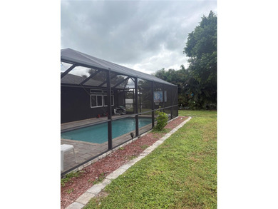 This Stunning 3 bed/2 bath Pool home in Harbour Heights is on Deep Creek Golf Club in Florida - for sale on GolfHomes.com, golf home, golf lot